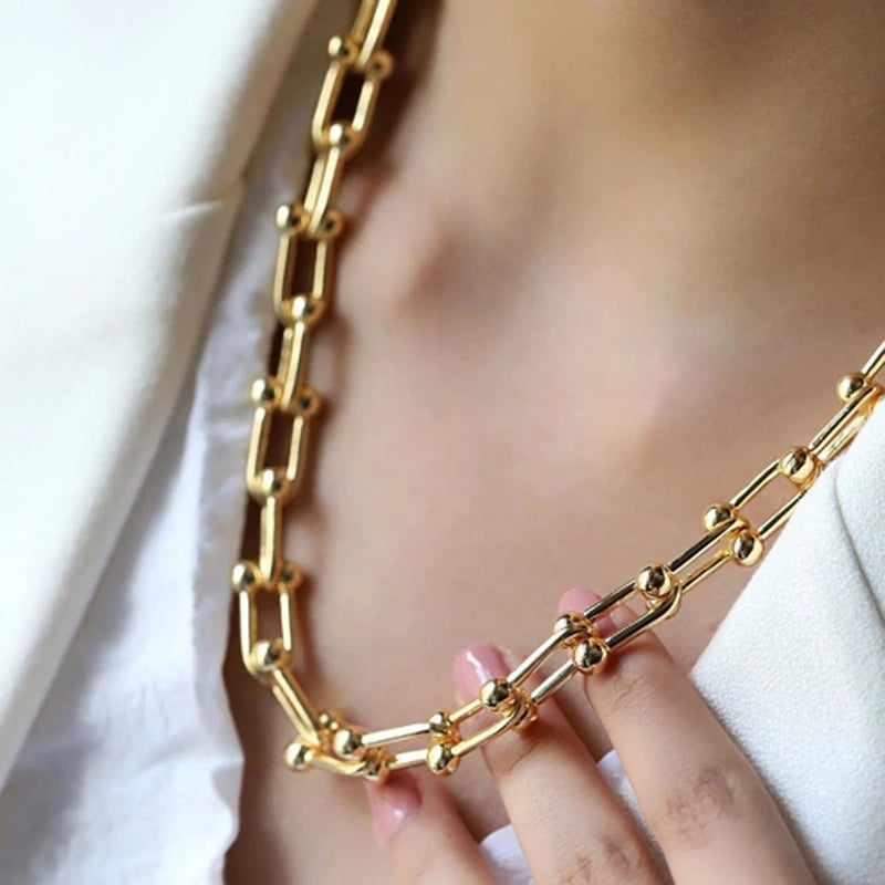 Parure collier et bracelet à maillons dorés