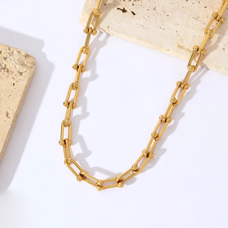 Parure collier et bracelet à maillons dorés