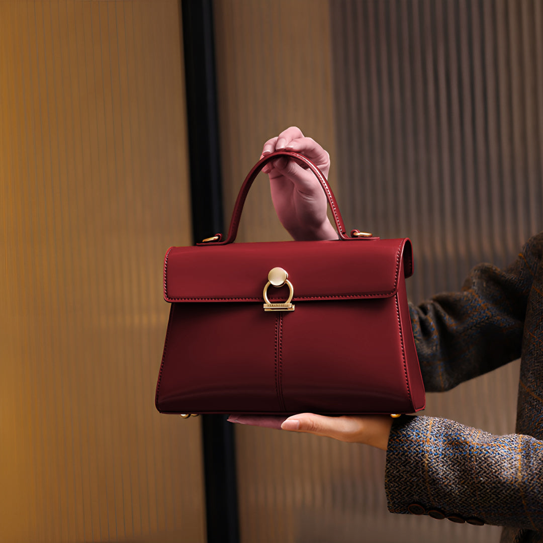 Compact Handbag with Top Handle and Gold Clasp