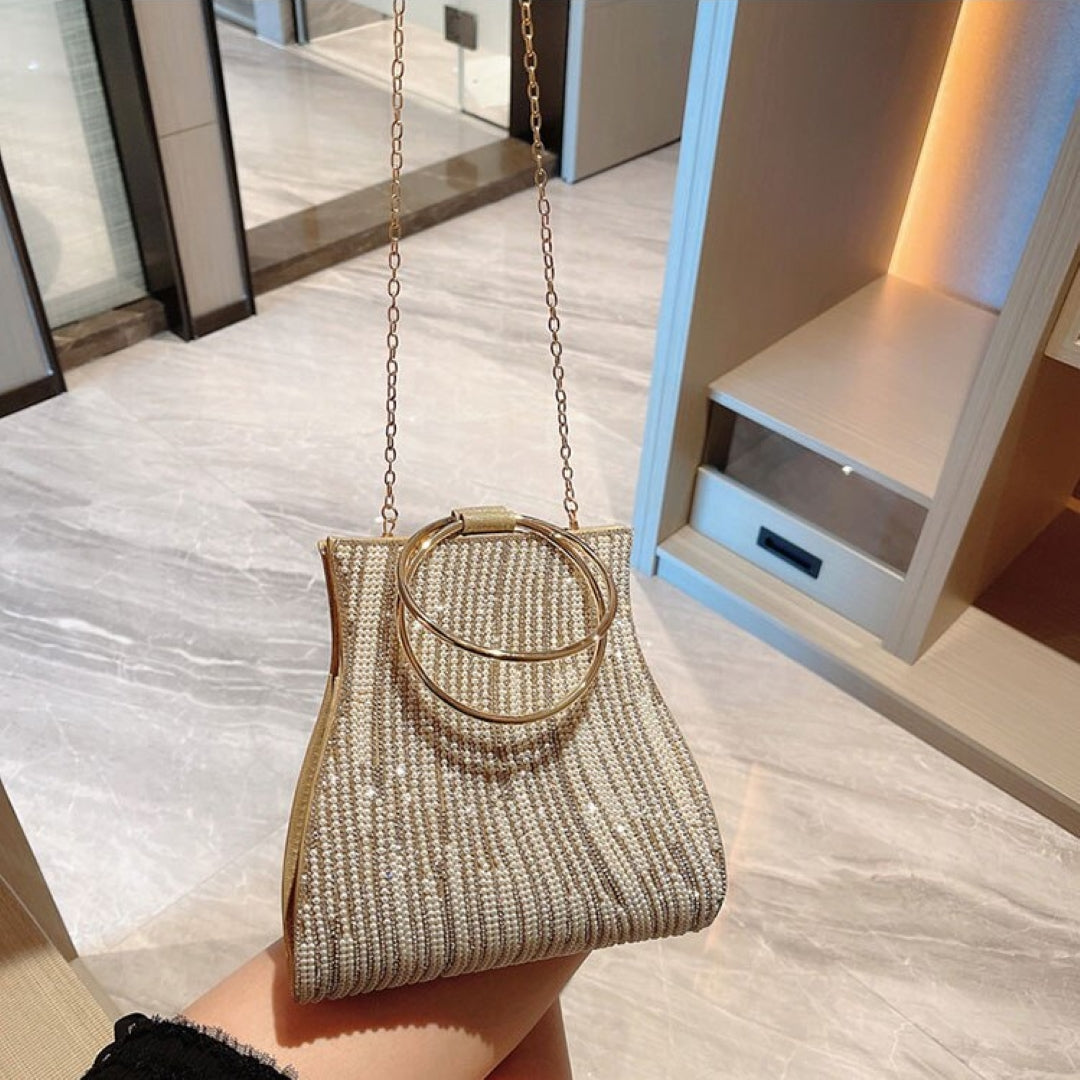 Petit sac à main doré serti de strass
