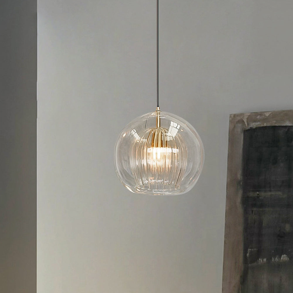 Suspension globe en verre transparent ou ambré