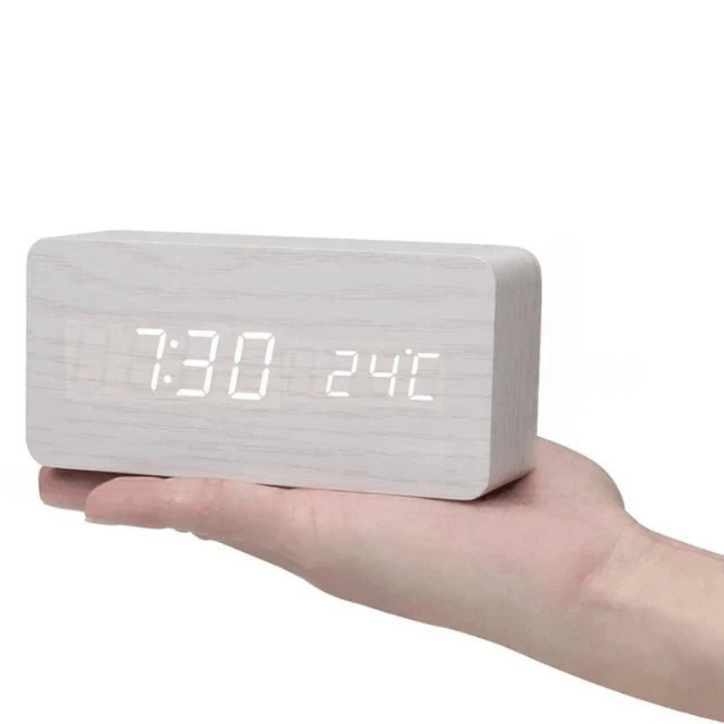 Horloge LED effet bois à commande sonore