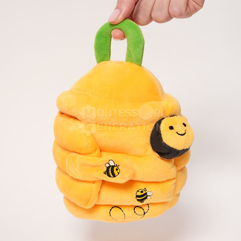 Ruche d'éveil en peluche avec 5 abeilles