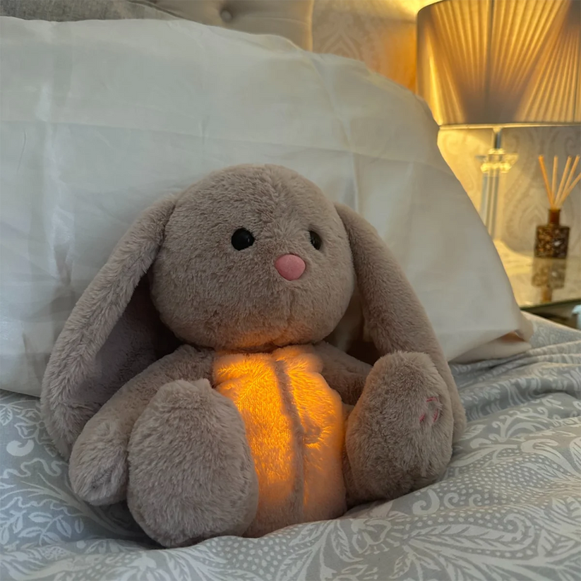 Peluche à respiration simulée, lumière et sons