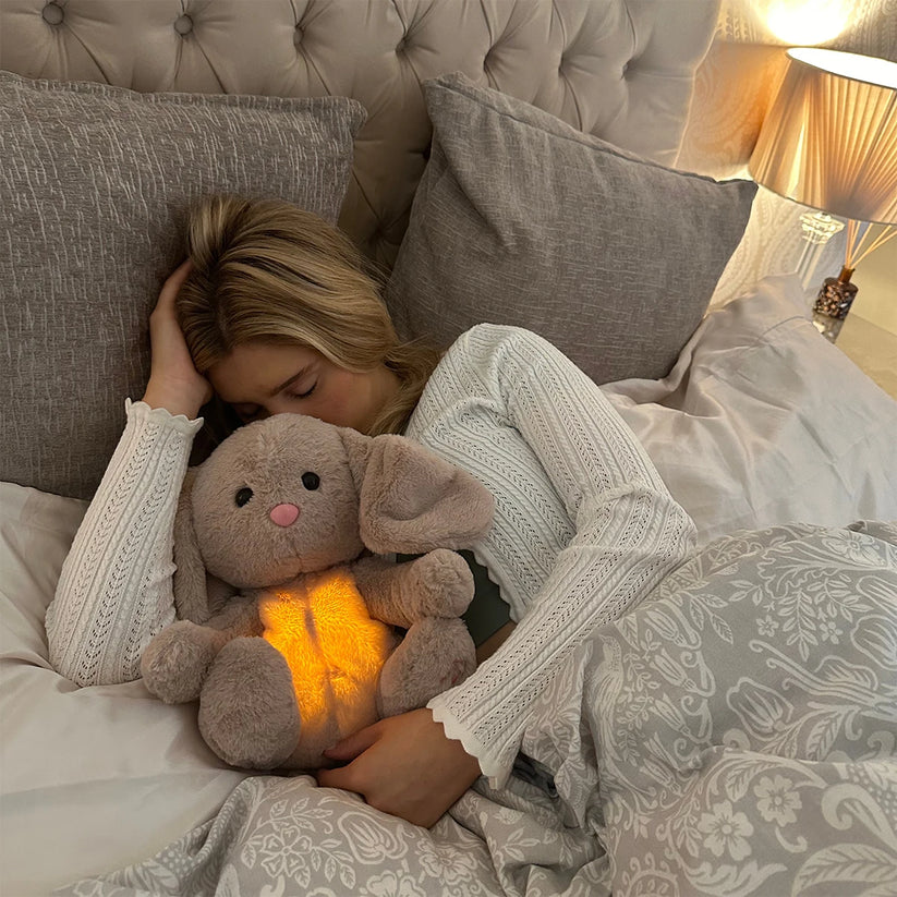 Peluche à respiration simulée, lumière et sons