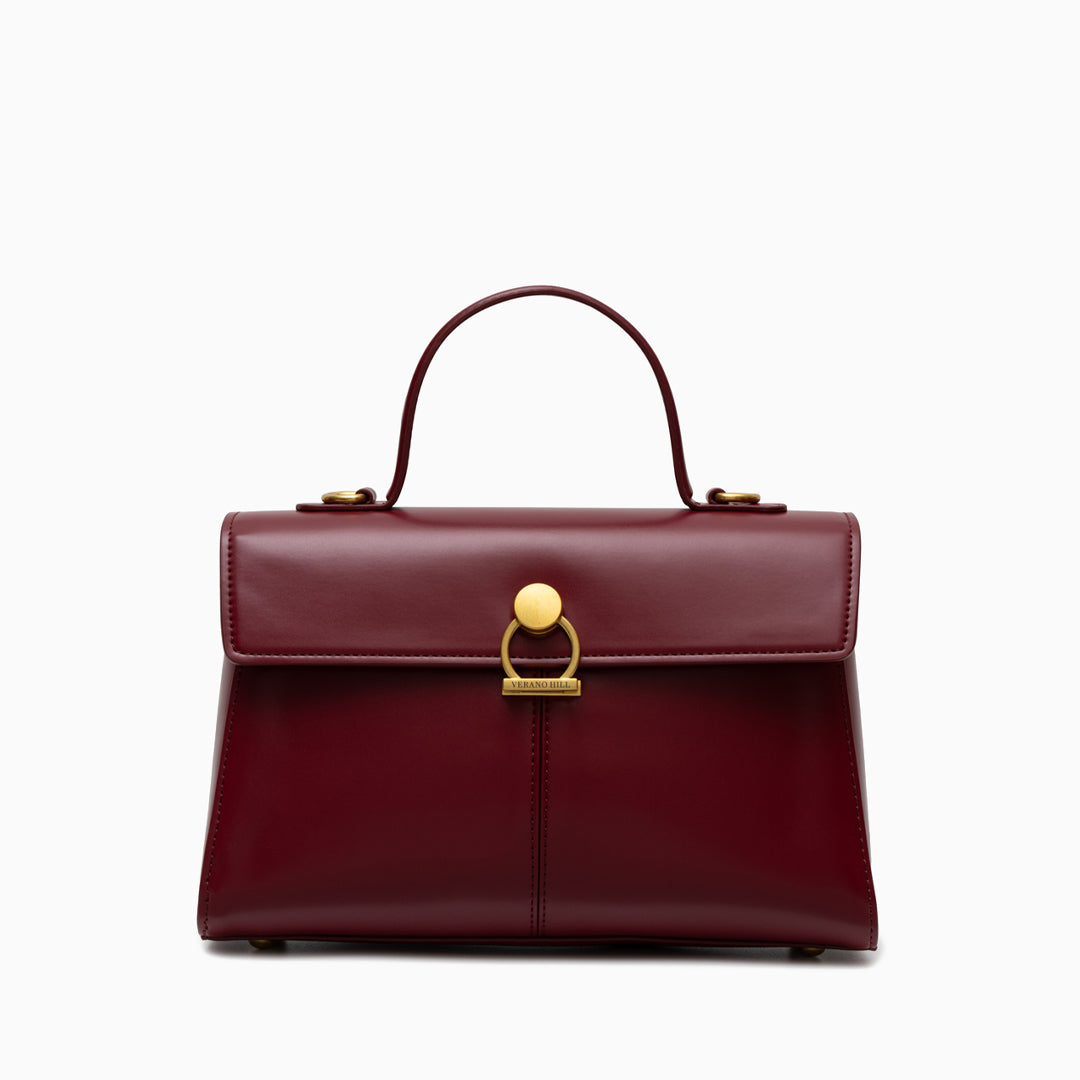 Compact Handbag with Top Handle and Gold Clasp