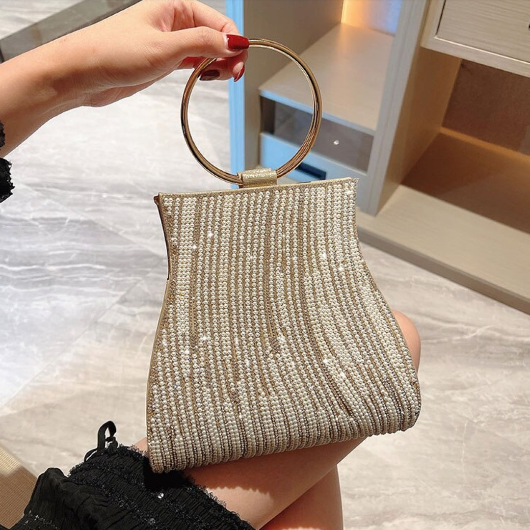 Petit sac à main doré serti de strass