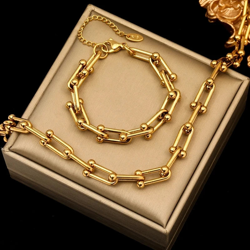 Parure collier et bracelet à maillons dorés