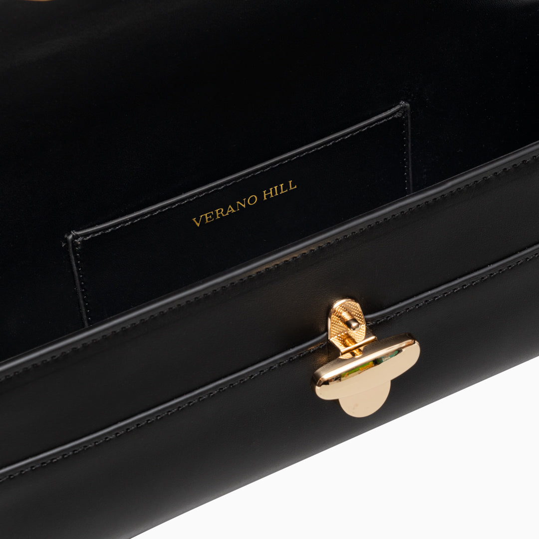 Sac à main long et fin en cuir, fermoir doré