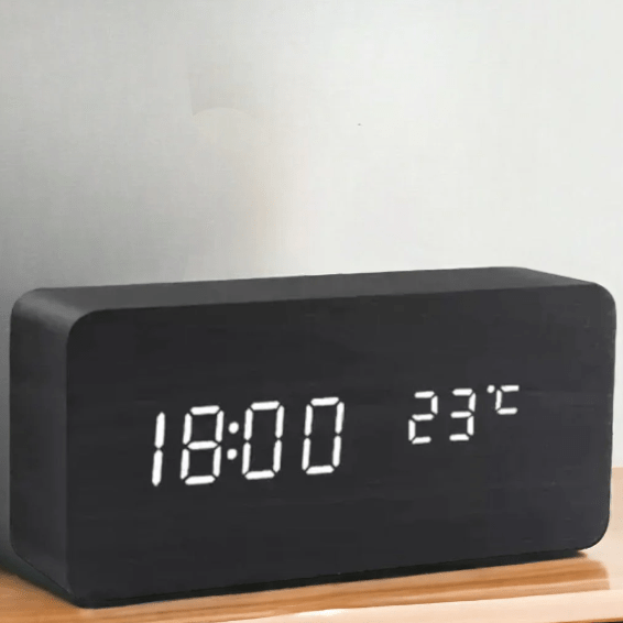 Horloge LED effet bois à commande sonore