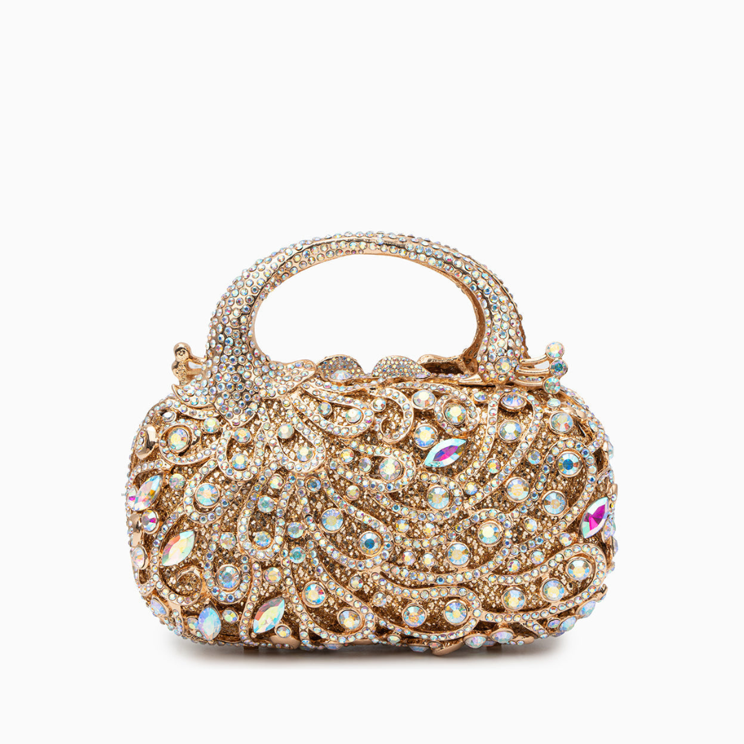 Sac à main doré à strass et motif de volutes