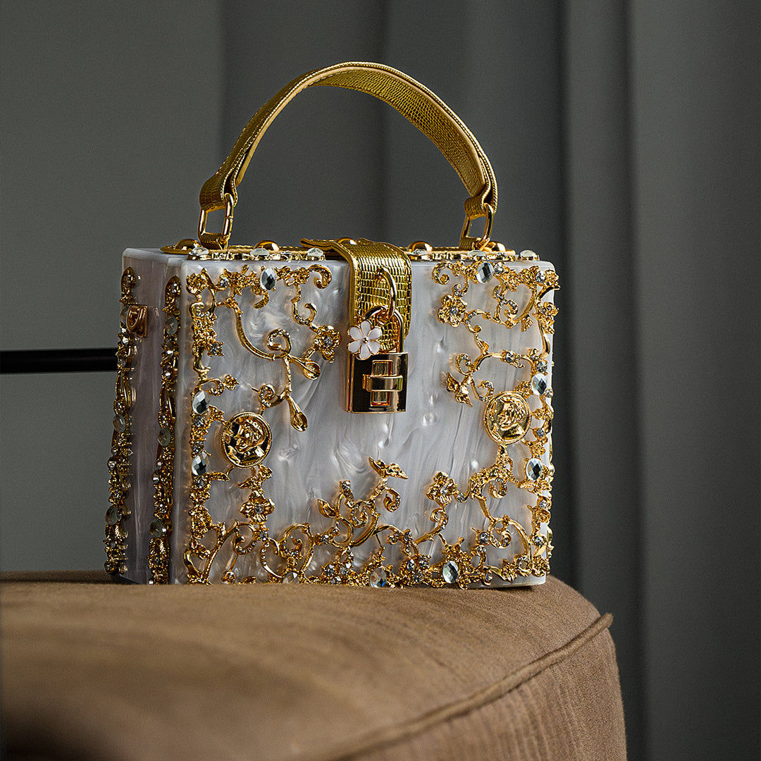Sac boîte en acrylique à ornements floraux dorés