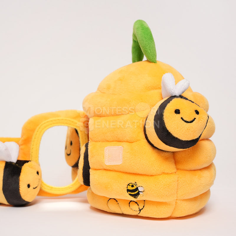 Ruche d'éveil en peluche avec 5 abeilles