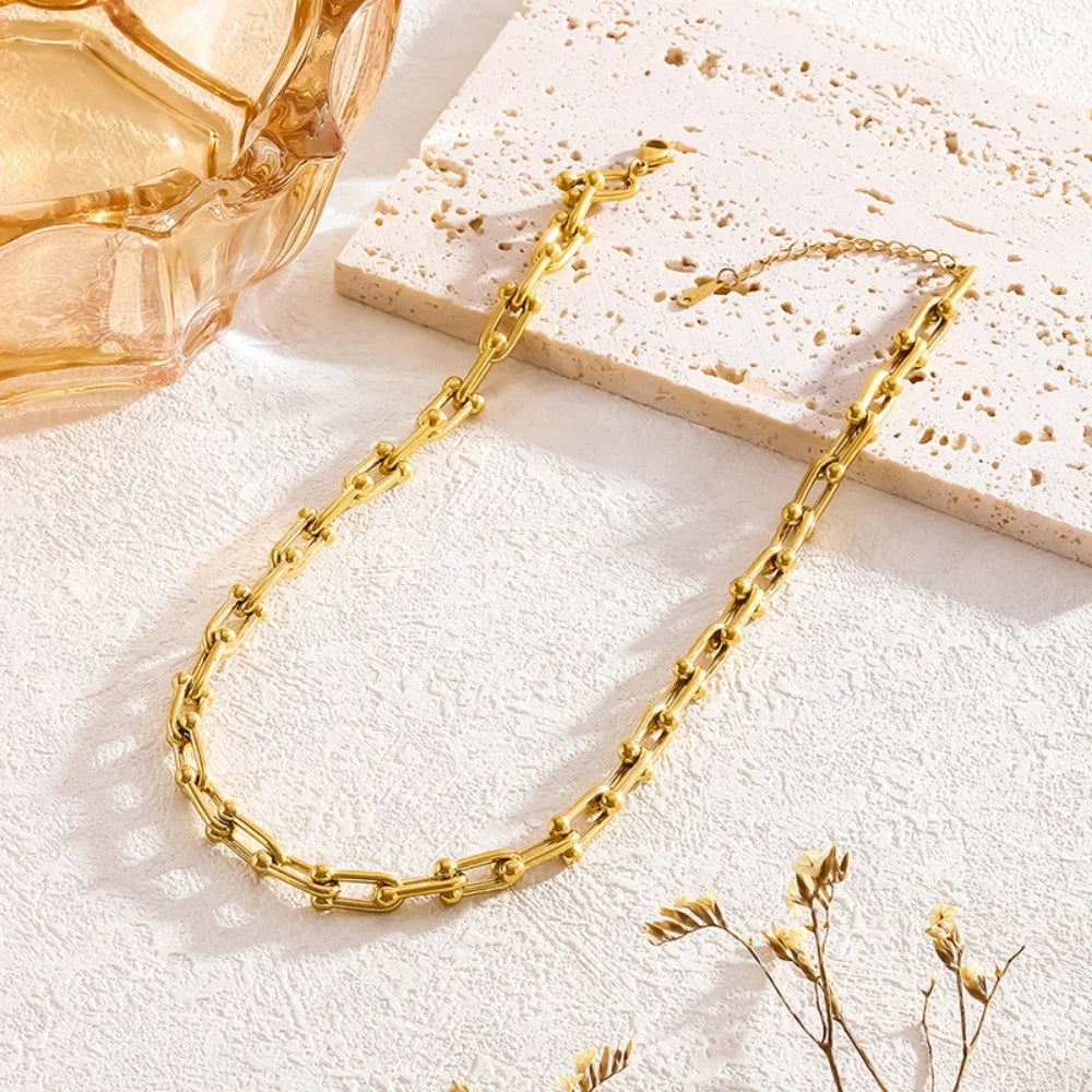 Parure collier et bracelet à maillons dorés