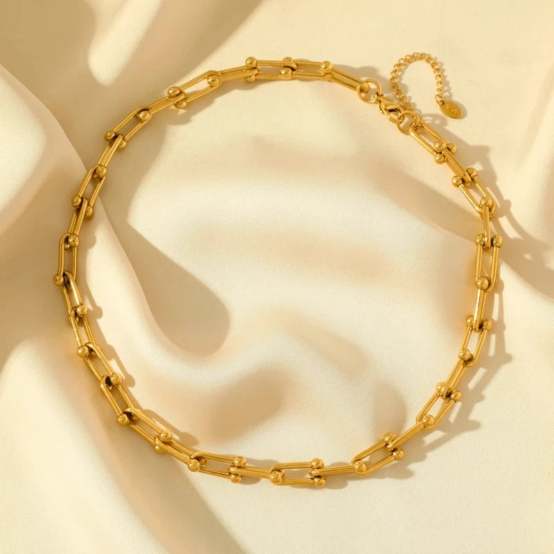 Parure collier et bracelet à maillons dorés