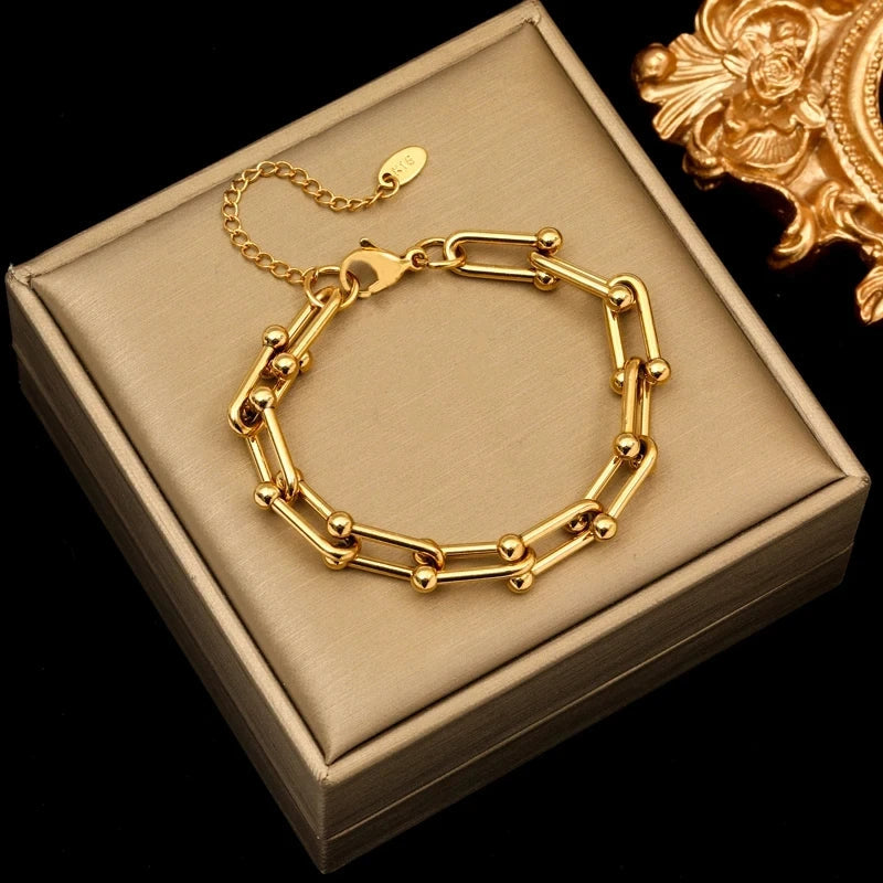 Parure collier et bracelet à maillons dorés